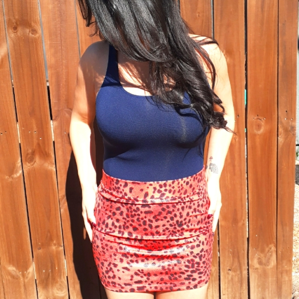 Orange and black snake skin and leopard skin mini skirt NWT boutique item